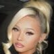 A filha de Travis Barker, Alabama, 19, exibe seios grandes em um vestido sensual após esclarecer uma visita ao hospital