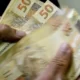 Cédulas e moedas de real brasileiro